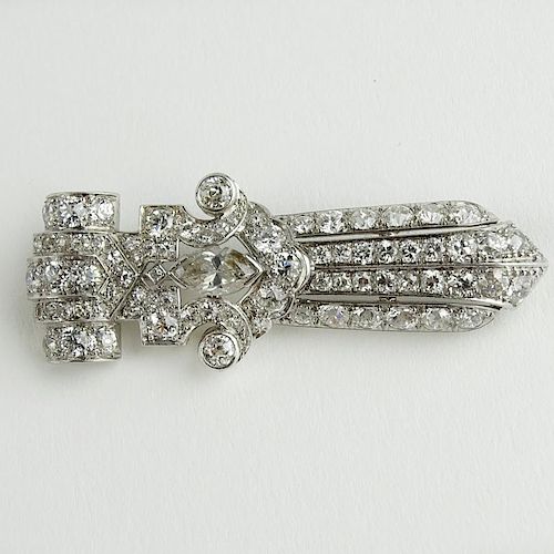 Finely Made Art Deco Round Cut Diamond and Platinum Brooch set in the center with Marquise Cut Diamond.
