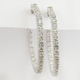 Pair of Lady's Approx. 2.80 Carat Round Cut Diamond and 14 Karat White Gold Hoop Earrings.