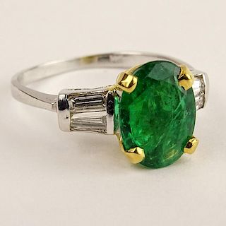 Lady's 2.75 Carat Emerald, .40 Carat Diamond and 14 Karat Gold Ring.