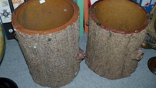 A pair of early 20th century Hexter Humpherson and Co. Newton Abbot brown salt glaze planters, model