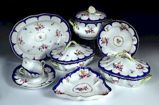 An early 20th century Herend Printemps pattern 869 dinner service, each piece painted with flowers w