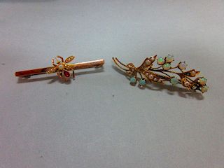 Two Victorian seed pearl and gemset brooches, the first a spray of cabochon opal flowers and graduat