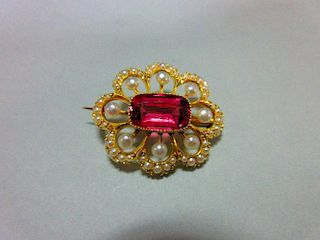 A pink tourmaline, pearl and seed pearl brooch, the rectangular cushion cut rose pink tourmaline cri