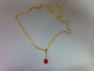 A ruby and diamond pendant with gold chain, the pendant designed as an articulated line of collet se