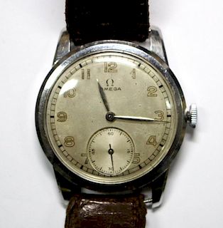 By Omega - a gentleman's steel cased wristwatch, circa 1940's, silvered dial with painted Arabic num