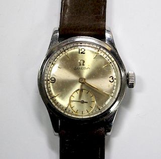 By Omega - a gentleman's mid-sized steel cased wrist watch, circa 1940's, the champagne coloured dia