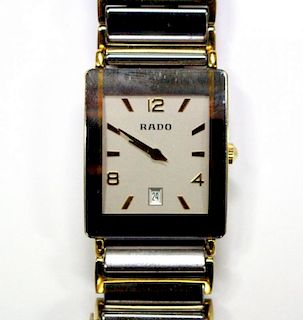 By Rado - a unisex 'Diastar' steel , titanium and gold plated quartz wristwatch, the rectangular sil