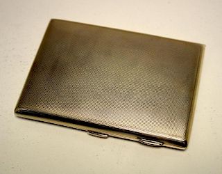 A 9ct gold pocket cigarette case, by S Blackensee & Co, Birmingham 1914, rectangular, engine turned,