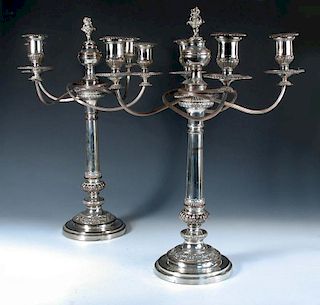 A very large pair of Old Sheffield plate candelabra, by Matthew Boulton, the bases rising from a ste