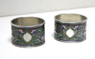 Two Russian silver and cloisonné enamel napkin rings. by Grachev, St Petersburg, 1896 (88 zol.), eac