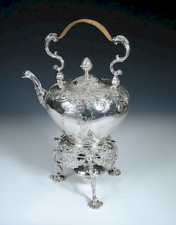 A large George II silver tea kettle on stand, maker's mark IC, possibly for J. Collins, London, 1755