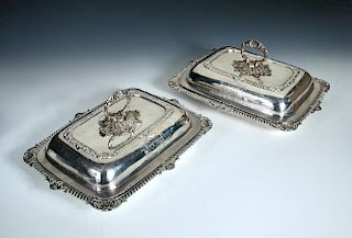 A pair of George III silver entree dishes and covers, by William Elliott, London 1818, each of recta
