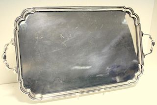 A small silver tray, by Roberts and Belk, Sheffield 1942, of plain rectangular shape with moulded ed