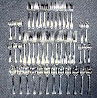 A late Victorian silver Old English pattern flatware service, mostly by Wakely & Wheeler, London 189