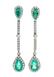Pair of 18k white gold earrings with 4 natural emeralds of 6 cts. approximately.