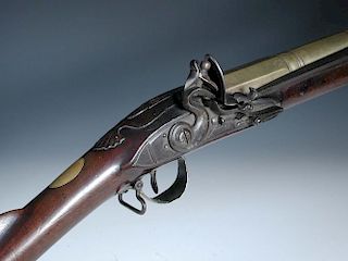 A late 18th century Blunderbuss by Jover, London with belled brass barrel in three stages with a mou
