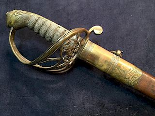 A Victorian officer's sword by Mole, with undecorated blade, pierced guard with cipher in a damaged