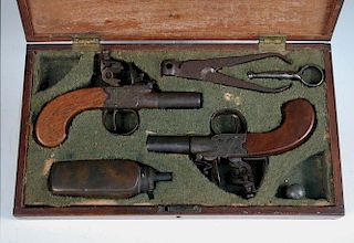 A pair of early 19th century flintlock pocket pistols, signed Frost, Peterboro, each with turn off b