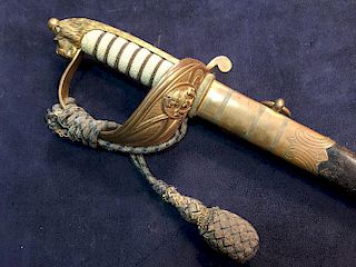 A George V Naval sword by Miller & Sons, London & Southampton, with RNR etched decoration, typical s