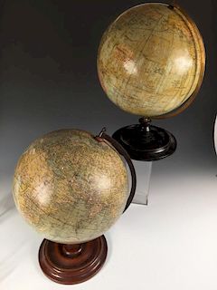 A Philips' 12 inch terrestrial globe, mounted to an ebonised turned wood stand, together with a 12 i