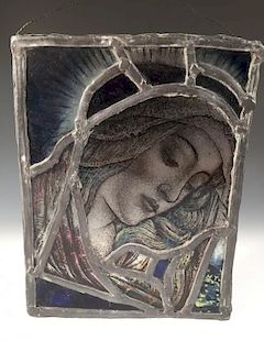 After Botticelli, a late 19th/early 20th century leaded glass panel of the Madonna, her head covered