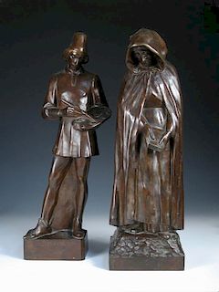 Karel Laloo (1883-1957), a bronze figure of a lady, she stands wearing a hooded cloak, she looks dow