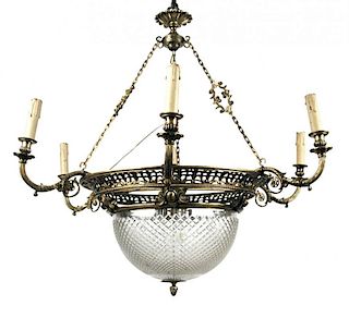 An Edwardian silvered brass and cut glass electrolier, the frame with pierced scrollwork and reeded