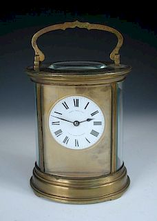 A French giant oval carriage clock, circa 1890, with silvered platfom lever escapement, enamel 8.5cm