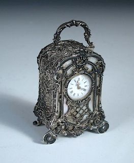 A Continental silver cased miniature carriage timepiece, with inset mother-of-pearl front panels, 23