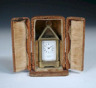 A French miniature lantern style carriage timepiece, circa 1900, with pyramid glazed top above 3cm (