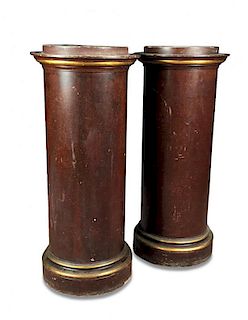 A pair of faux porphyry pedestal columns, with moulded gilt edged capitals and plinth bases (2) 126