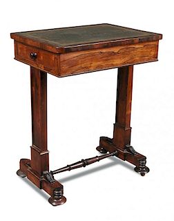 A Regency rosewood writing table, green leather lined top with end drawer fitted for pens and ink we