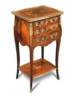 A Louis XV revival rosewood and gilt mounted table ambulante, of serpentine outline with floral marq
