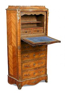 A Louis XV revival tulip wood semaniere, of serpentine outline with marble top and gilt metal mounts