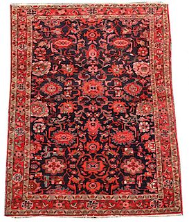 A modern Hamadan rug, floral design on a dark red ground 227 x 147cm (89 x 57in) <br. <br>Good level