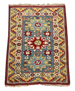 A Turkish rug, of Caucasian design 193 x 127cm (75 x 50in) <br. <br>Good colours and good pile level