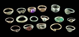 17 Roman Brass, Bronze, Glass, & Amethyst Rings