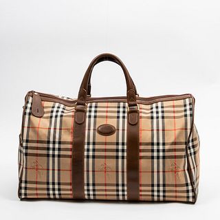 Vintage Burberry Boston Travel Bag, in beige brown plaid canvas with brown leather accents, opening to a dark brown canvas lined interior with a side 