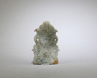 A Carved Jadestone Pendant
