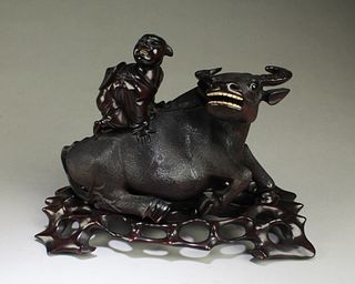 A Carved Hardwood Water Buffalo Statue