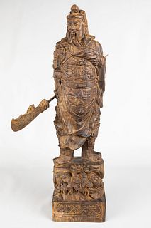 A Carved Burlwood GuanYu Statue