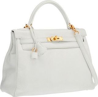 Hermes 32cm White Clemence Leather Retourne Kelly Bag with Gold Hardware Good to Very Good Condition 12.5" Width x 9" Height x 4" Depth