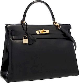 Hermes 35cm Black Calf Box Leather Retourne Kelly Bag with Gold Hardware Very Good to Excellent Condition 14" Width x 10" Height x 5" Depth
