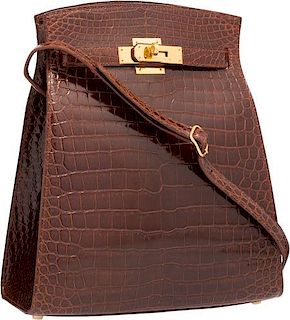 Hermes 24cm Shiny Miel Porosus Crocodile Kelly Sport Bag with Gold Hardware Excellent Condition 9.5" Width x 11" Height x 4.5" Depth