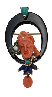 Tambetti 14 Karat Gold Brooch/Pendant, mounted with pink coral face and various stones, height 2 inches.