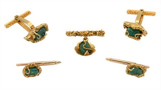 Five Piece 18 Karat Gold and Emerald Mens Set, to include a pair of cufflinks; two shirt buttons; along with a pin/tie clip, each set with emerald; la