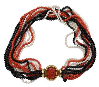 Oggi 18 Karat Gold 12 Strand Necklace, having 4 coral, 4 pearl, along with 4 onyx beads mounted with 18 karat gold clasp with carved coral, 18 1/2 inc