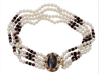 Pearl and Ruby Four Strand Necklace, having gold and onyx flat beads, large 14 karat gold clasp mounted with rubies and 12 diamonds around center ruby