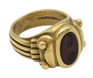 Kieselstein-Cord 18 Karat Gold Ring, set with oval red stone with sun and moon, size 4 3/4, 16 grams.