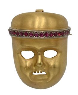 Kieselstein-Cord 18 Karat Gold Mask, having line of 19 rubies, height 1 3/8 inches, 27 grams.